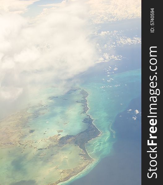 Colorful tropical islands and blue water from above. Colorful tropical islands and blue water from above