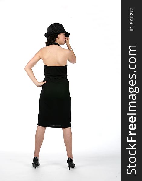 Back View Of Teen Wearing Black Dress And Top Hat