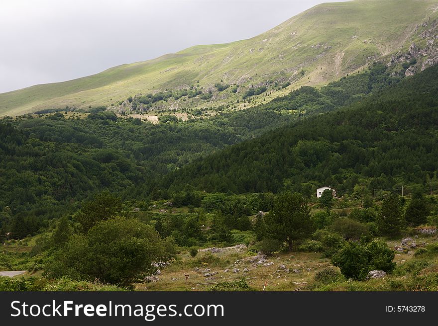 Photo of isolated house in the woods, italy