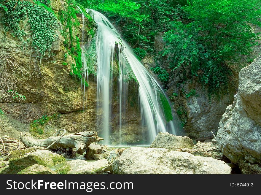 The well-known beautiful waterfall Djur Djur  in forest, Crimea, Ukraine. The well-known beautiful waterfall Djur Djur  in forest, Crimea, Ukraine