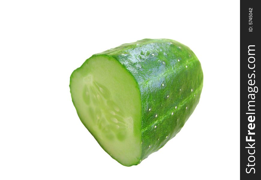 Half of fresh green cucumber on the white background