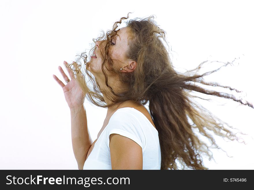 Stylish shot of nice young long hair woman on white back. Stylish shot of nice young long hair woman on white back