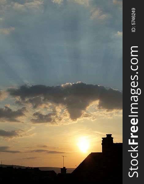 Urban sunrise with clouds and funnel. Urban sunrise with clouds and funnel