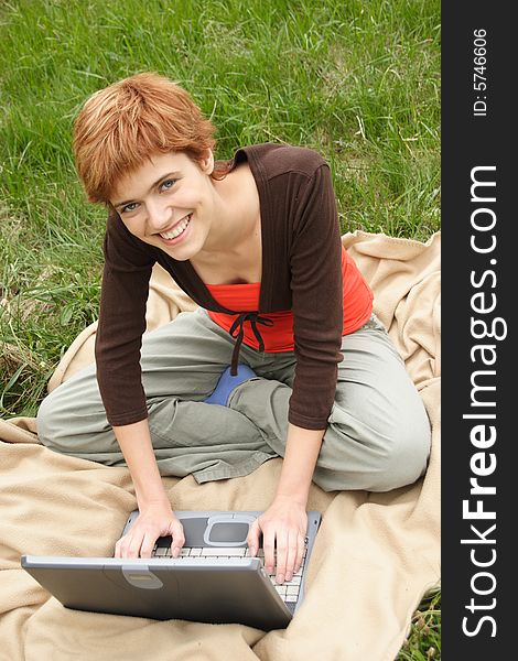 Young girl working on laptop