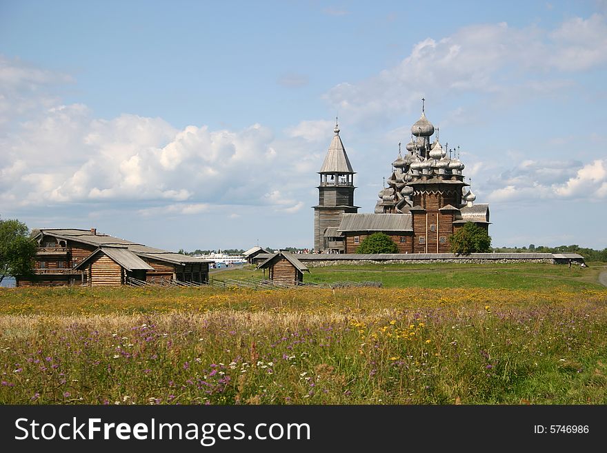 The museum of wooden architecture is located on the Kizhi island on Lake Onega in the Republic of Karelia, Russia. The Kizhi Pogost is the area inside the perimeter wall or fence and includes 2 large churches and a bell-tower.