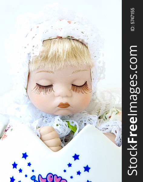 Baby doll on white background