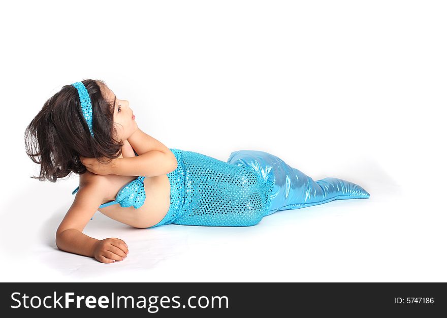 Little mermaid wearing a real mermaid costume perfect for photo manipulation.
