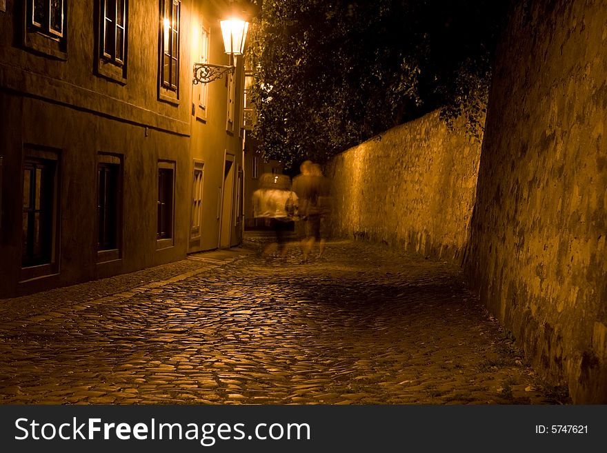 Night lane with couple on New World, on Hradcany in Prague. Night lane with couple on New World, on Hradcany in Prague.