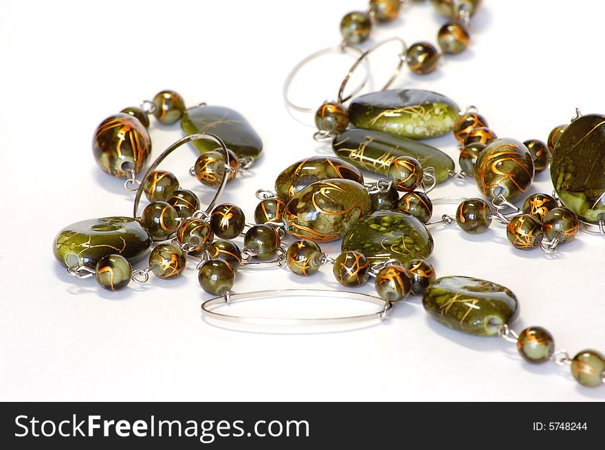 Decorative beads with green stones.
