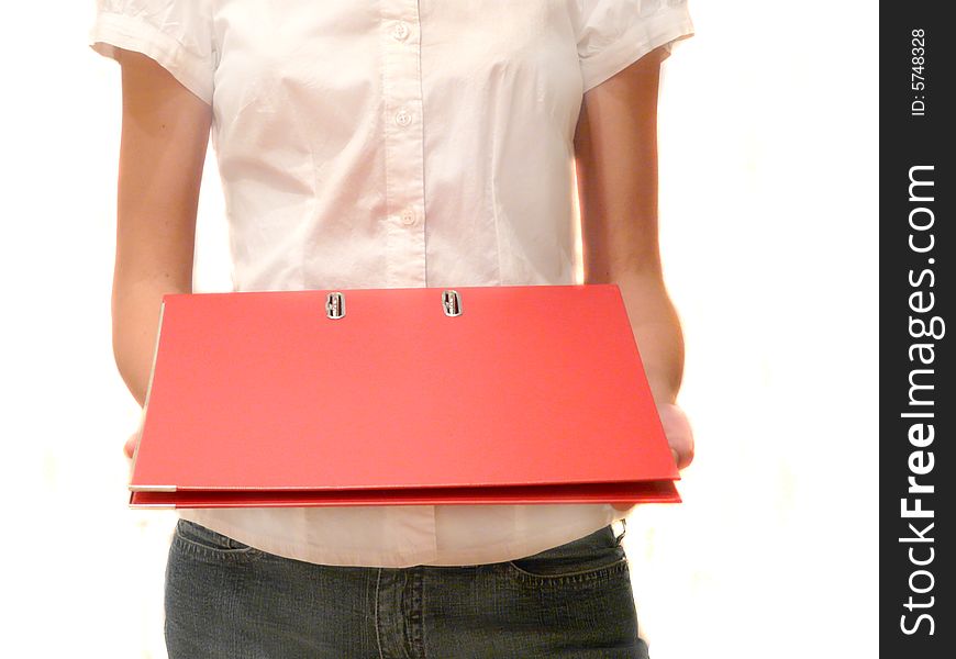 A girl with office folder red color close-up. A girl with office folder red color close-up