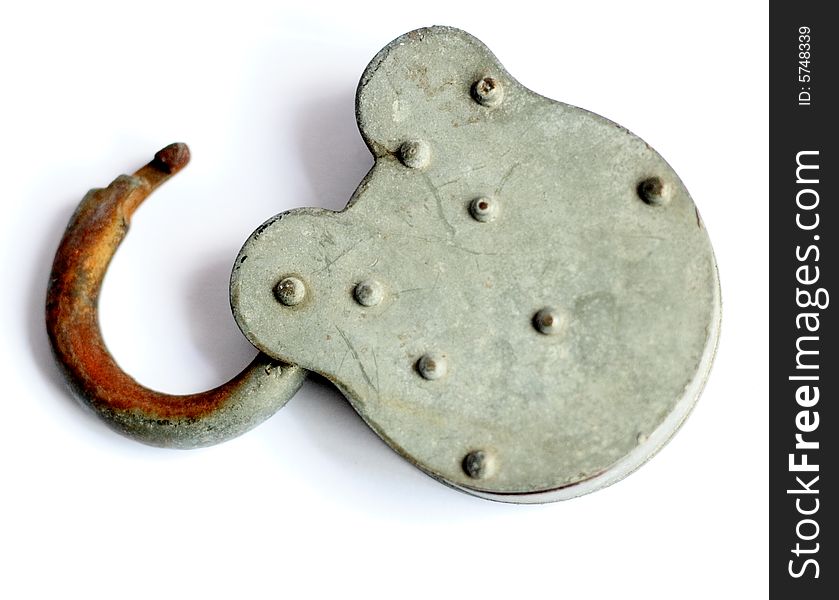 An old, sturdy, rusted padlock, laying open on a white background. An old, sturdy, rusted padlock, laying open on a white background.