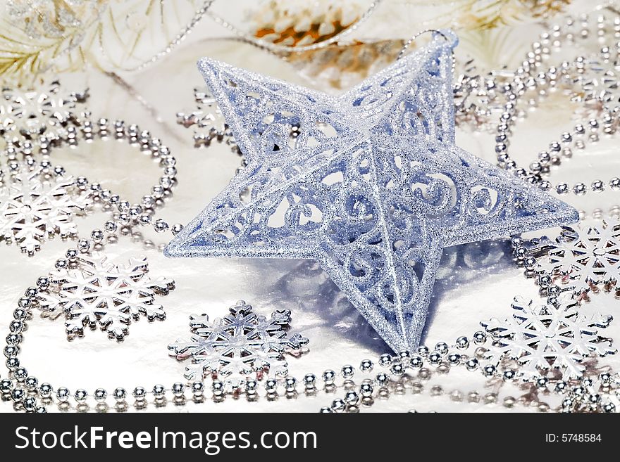 Star decoration on silver background