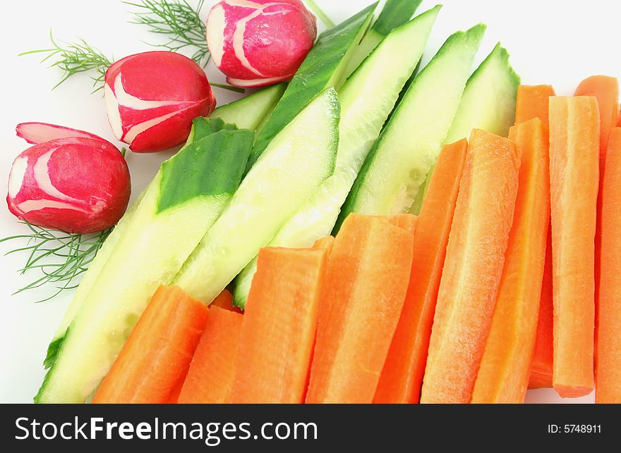 Radish, cucumbers and carrots assortment. Radish, cucumbers and carrots assortment