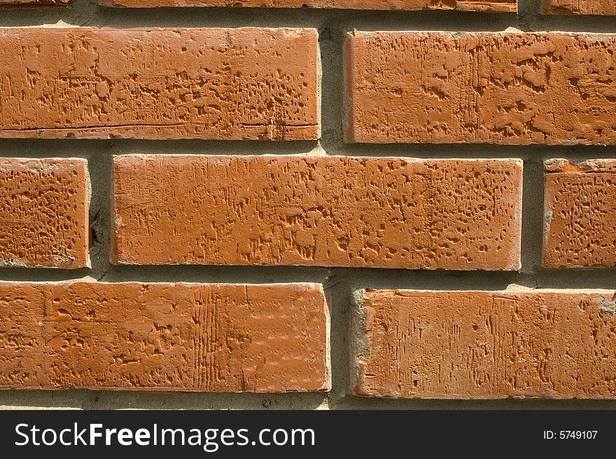 Wall  laid out by red bricks. Wall  laid out by red bricks.