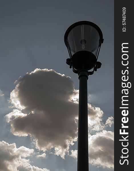 Street lamp on the sky background