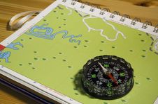 Navigation Compass And Map Stock Photo Navigation Compass And Map Stock Photo