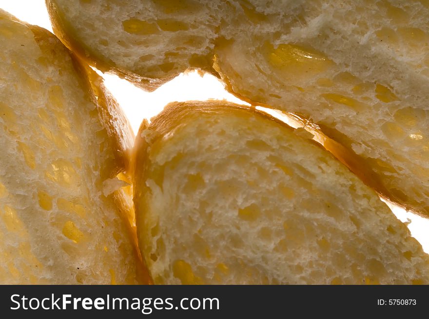 Slices of bread on light background. Slices of bread on light background