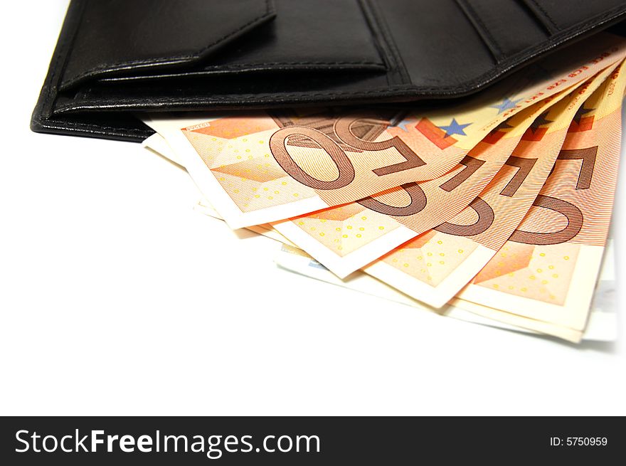 Fifty euro bank notes and black leather wallet. Fifty euro bank notes and black leather wallet