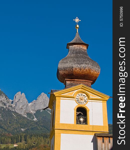 Tower of small church in the Alps