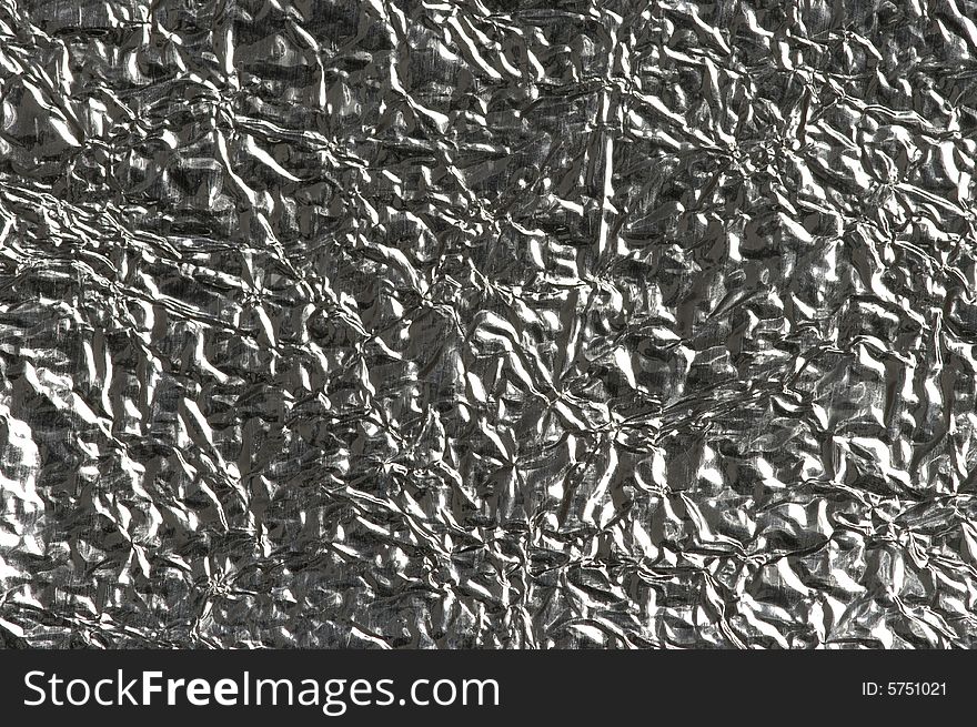 Background of textured uneven foil