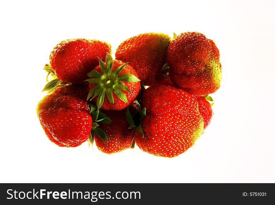 Strawberries couples up a white background. Strawberries couples up a white background