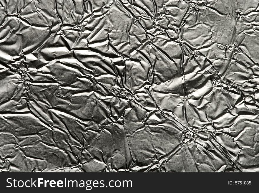 Background of textured uneven foil