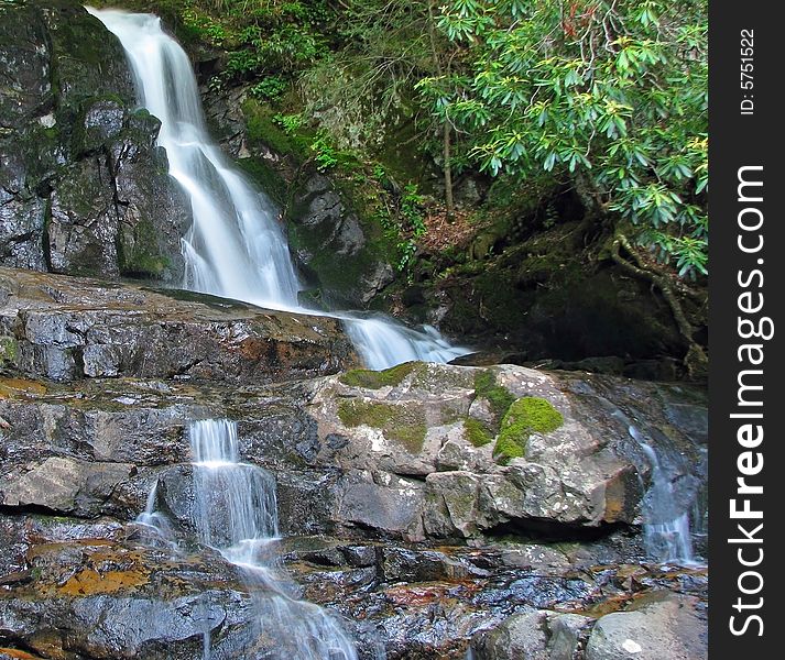 Laurel Falls waterfall in the Smoky Mountain National Park, USA. Laurel Falls waterfall in the Smoky Mountain National Park, USA.