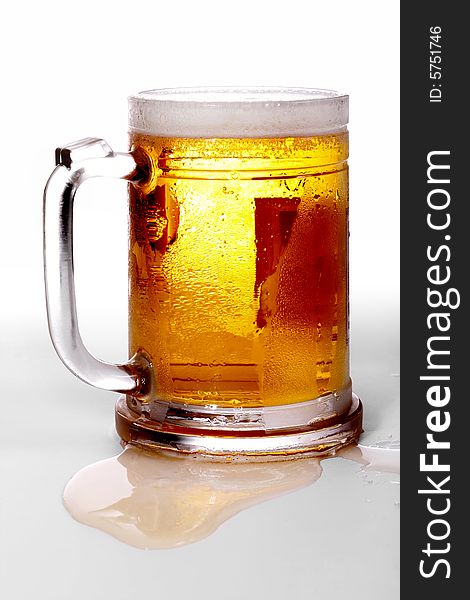 Glass of beer on the white background