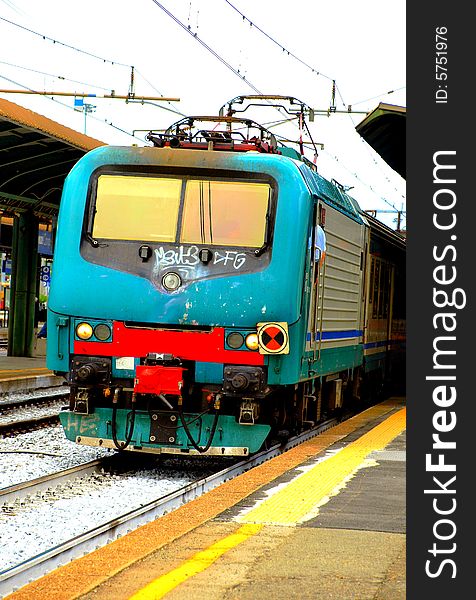 A stationary train in a station