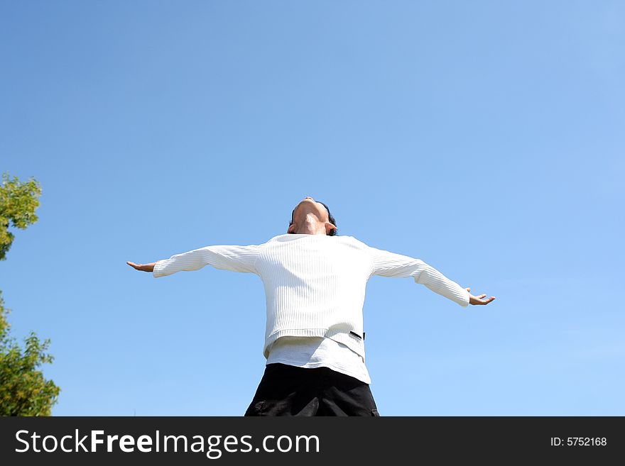 Man rise arm under hot tropical day