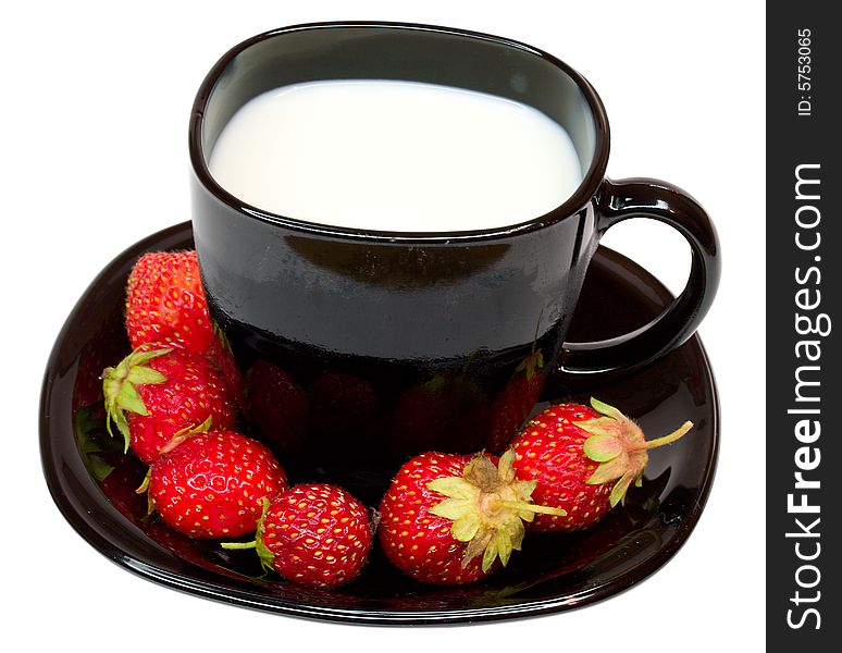 Close-up cup of milk and strawberries, isolated on white