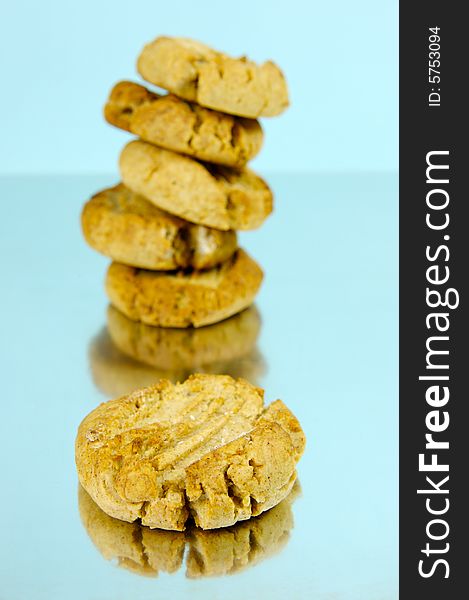 Ginger biscuits isolated against a blue background