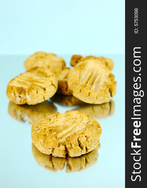 Ginger biscuits isolated against a blue background