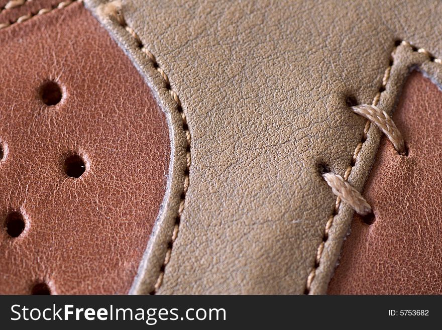 Multiwall leather with decorative sutures. Multiwall leather with decorative sutures