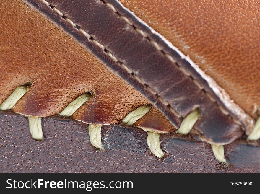 Multiwall leather with decorative sutures. Multiwall leather with decorative sutures