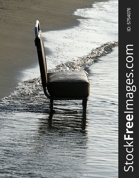 A seascape with a bus chair , early in the morning. A seascape with a bus chair , early in the morning