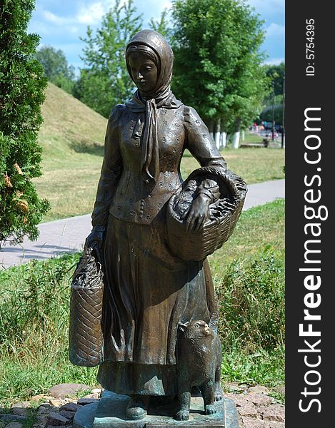 Sculpture of russian peasant woman with basket, Dmitrov town, Russia