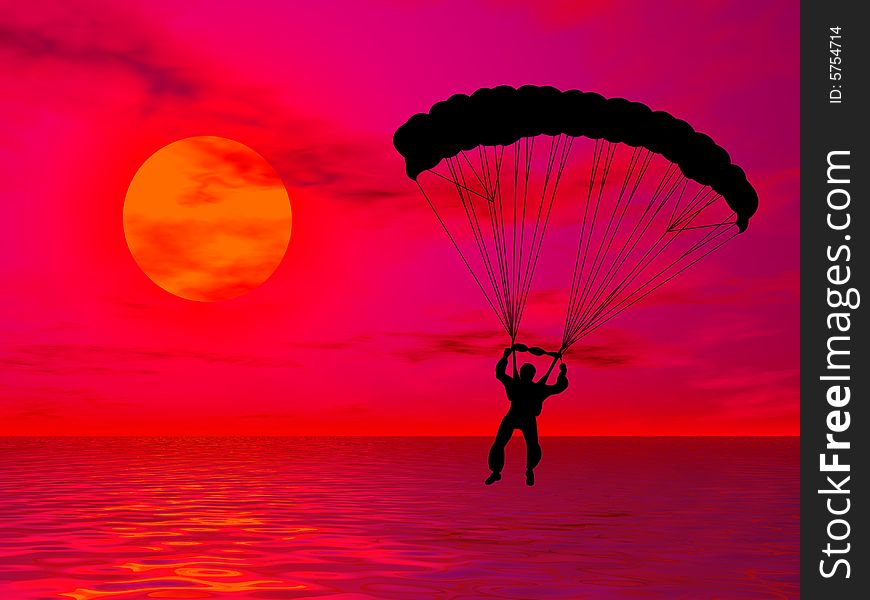 Parachutist in silhouette against a colorful sunset