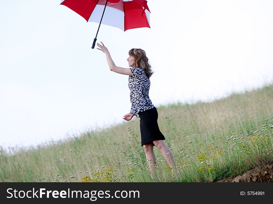 A beautiful girl and an umbrella. A beautiful girl and an umbrella