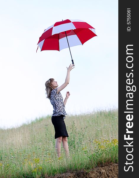 A beautiful girl and an umbrella. A beautiful girl and an umbrella