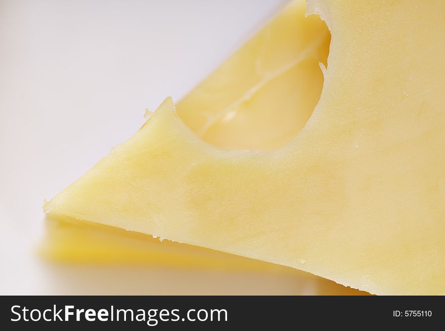 Big piece of cheese. Close-up. Narrow depth of field.