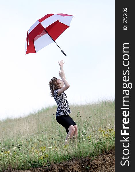 A beautiful girl and an umbrella. A beautiful girl and an umbrella