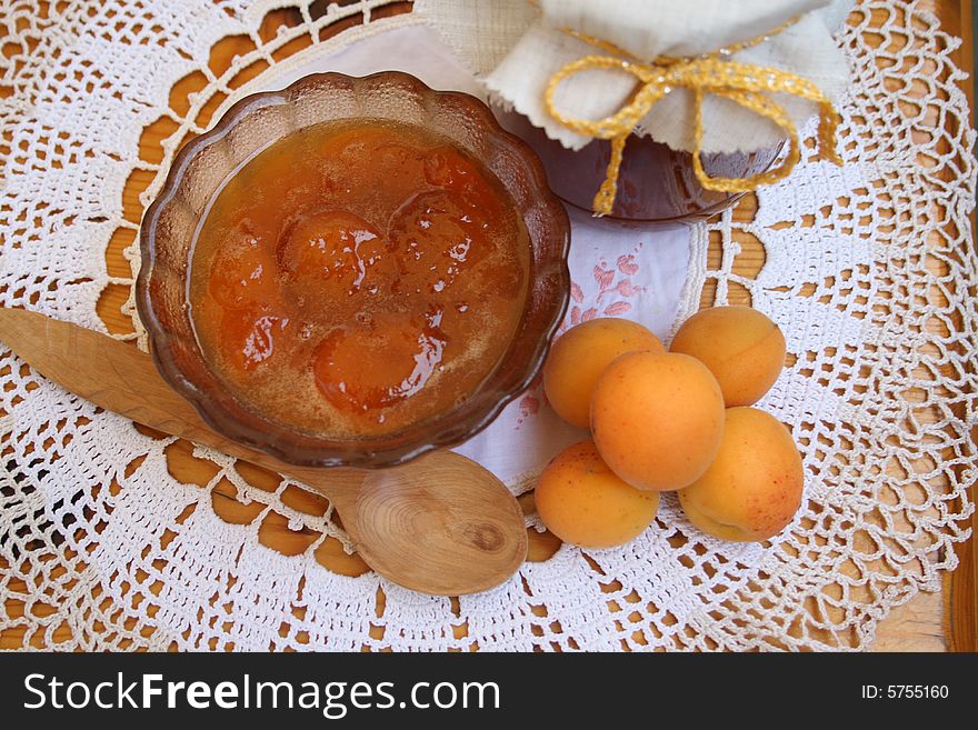 Apricot jam of house preparation on a white cloth