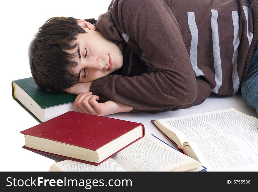 The sleeping student with the books isolated on a white background