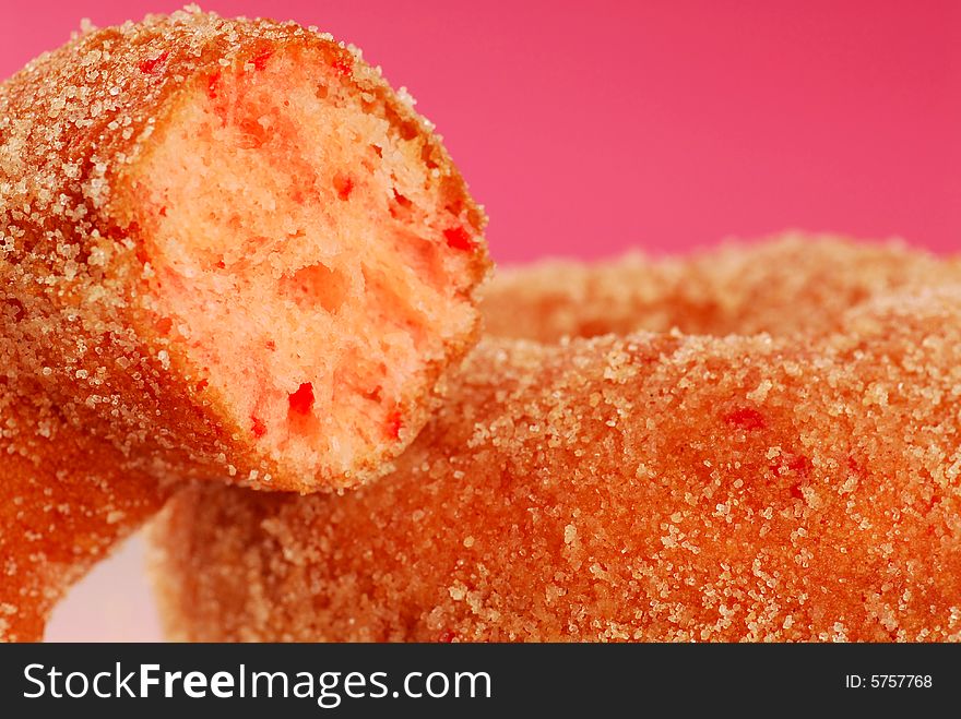 Closeup of freshly made strawberry doughnuts. Closeup of freshly made strawberry doughnuts