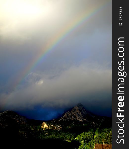 A spectacular rainbow over the Cir mountain in a apocalyptic scenery