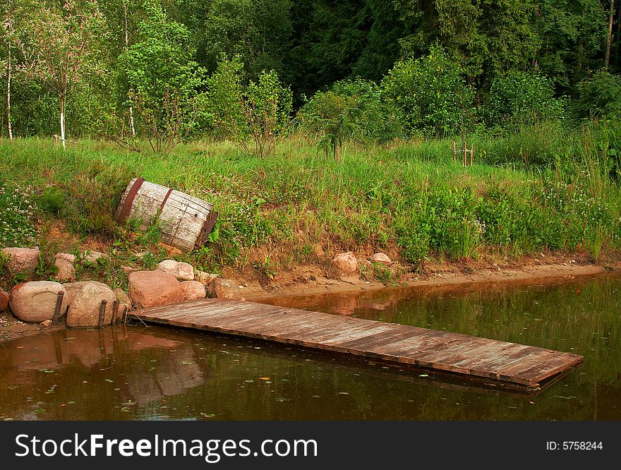 A small lake inside an abandoned forest