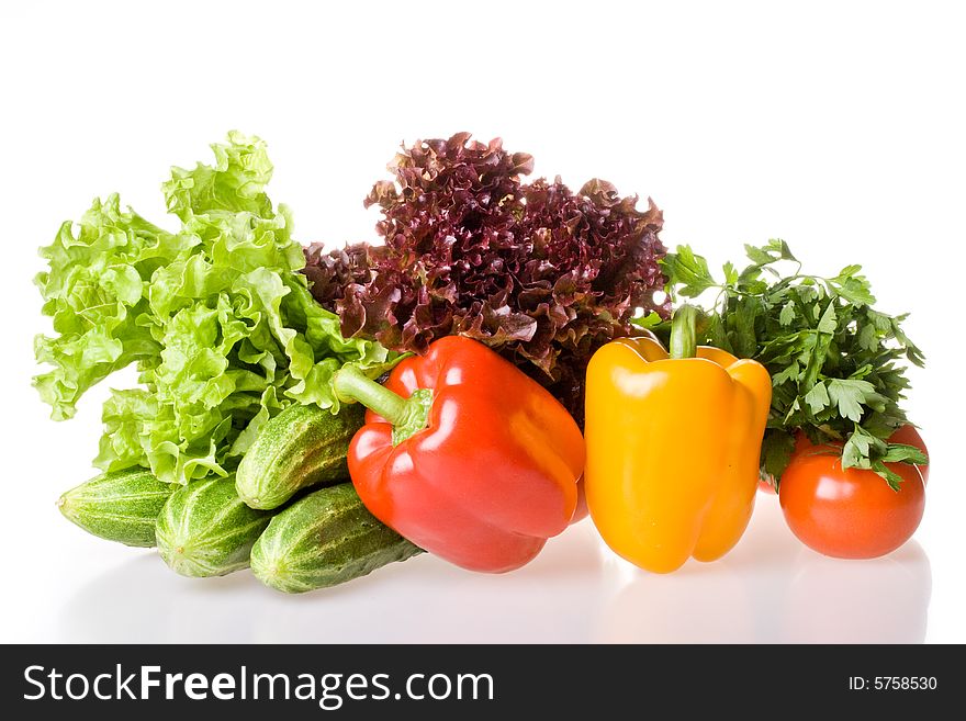 Fresh raw vegetables on a white background. Fresh raw vegetables on a white background