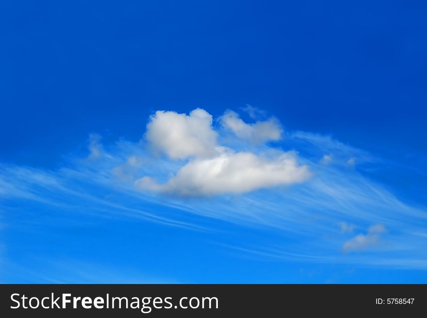Sky landscape with beautiful clouds over two shades of blue