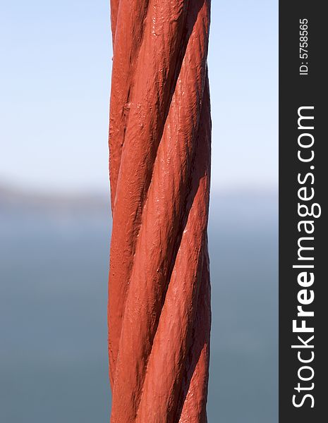 A shot of a supporting cable of the Golden Gate Bridge. A shot of a supporting cable of the Golden Gate Bridge.